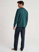 Men model is wearing Pyjama made of 100% Cotton in Turquoise, Unicoloured from the Relax Essentials series by CALIDA, Back view