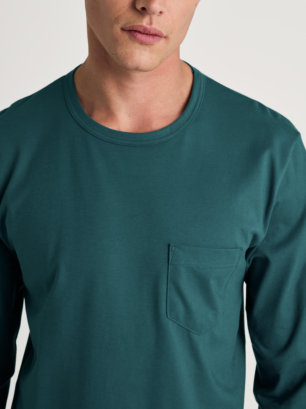 Men model is wearing Pyjama made of 100% Cotton in Turquoise, Unicoloured from the Relax Essentials series by CALIDA, Detail