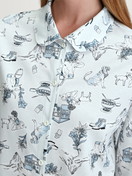 Women model is wearing Button-Up Pyjama made of 100% Cotton in Blue, Patterned from the Swiss Resort series by CALIDA, Detail