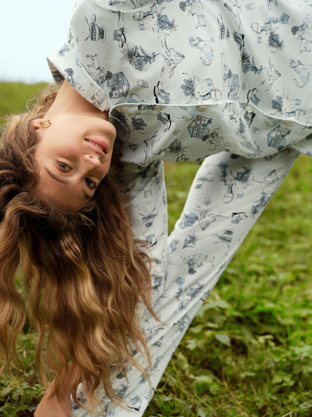 Women model is wearing Button-Up Pyjama made of 100% Cotton in Blue, Patterned from the Swiss Resort series by CALIDA, Additional Image