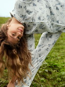 Women model is wearing Button-Up Pyjama made of 100% Cotton in Blue, Patterned from the Swiss Resort series by CALIDA, Additional Image