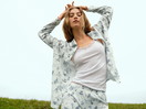Women model is wearing Button-Up Pyjama made of 100% Cotton in Blue, Patterned from the Swiss Resort series by CALIDA, Additional Image