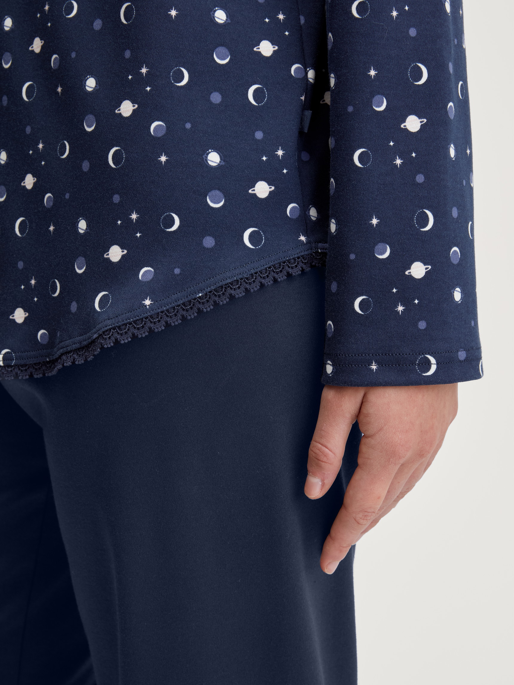 Women model is wearing Button-Up Pyjama made of 100% Cotton in Blue, Patterned from the Midnight Dreams series by CALIDA, Detail