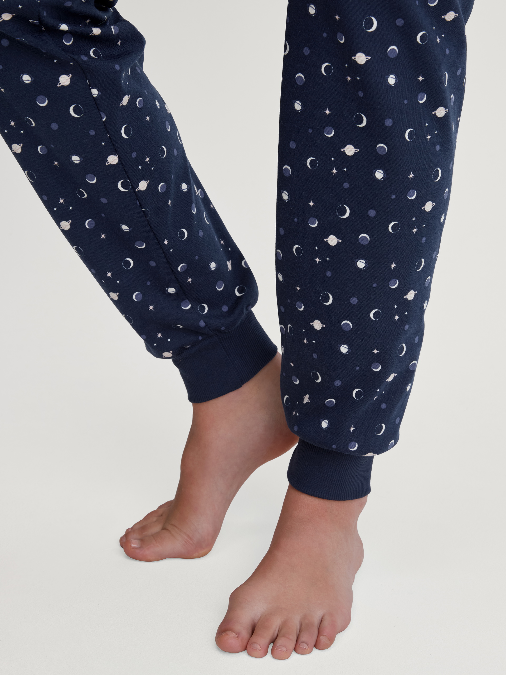 Women model is wearing Pyjama with cuff made of 100% Cotton in Blue, Patterned from the Midnight Dreams series by CALIDA, Detail