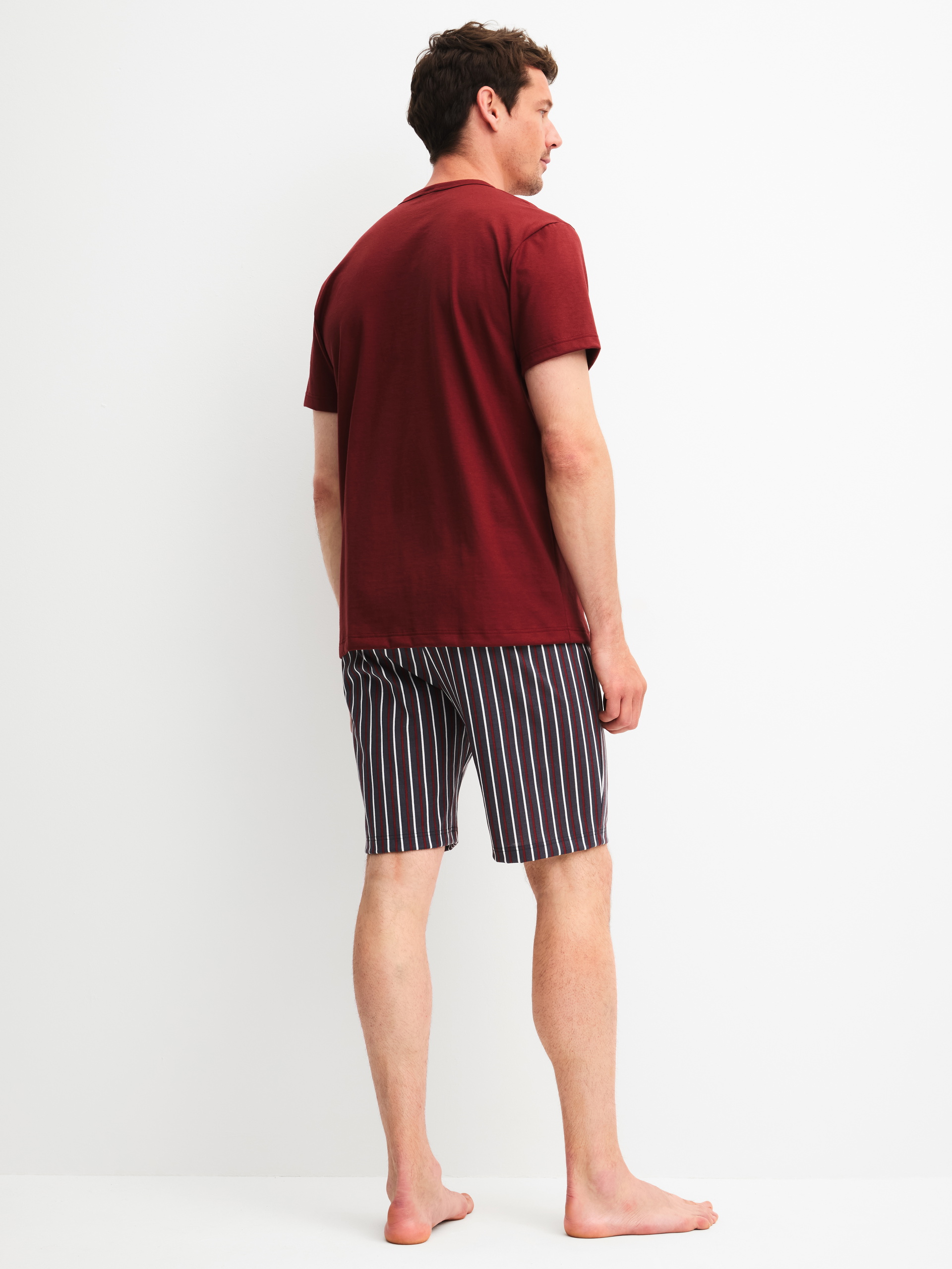 Men model is wearing Short pyjama made of 100% Cotton in Red, Striped from the Cotton Special series by CALIDA, Back view