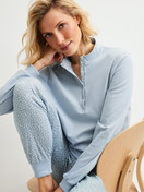 Women model is wearing Ribbed Cuff Pyjamas made of 100% Cotton in Blue, Patterned from the Midnight Dreams series by CALIDA, Additional Image