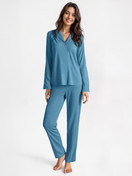 Women model is wearing Button-Up Pyjama made of 100% Cotton in Blue, Unicoloured from the Nightwear Xtra series by CALIDA, Front view