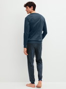 Men model is wearing Pyjama with cuff made of 100% Cotton in Grey, Floral from the Relax Selected 4 series by CALIDA, Back view