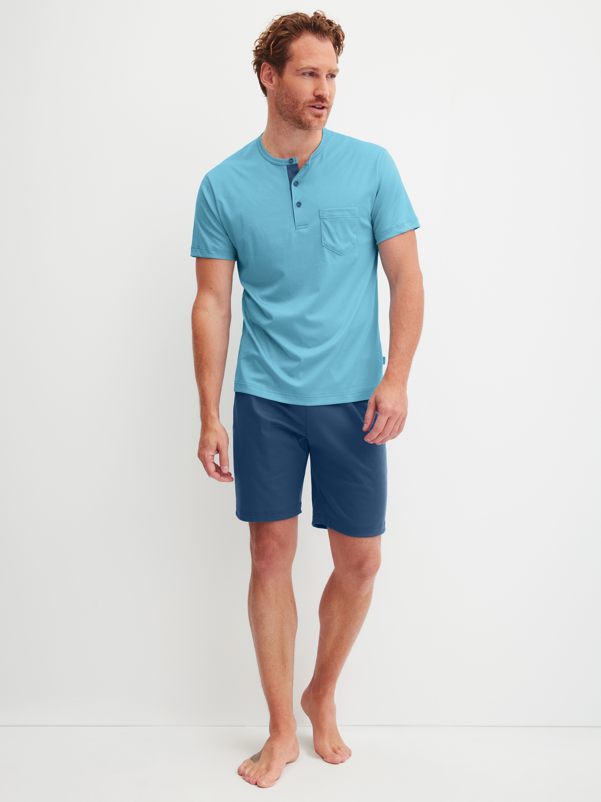 Men model is wearing Short pyjama made of Pima® Cotton in Blue, Patterned from the Relax Superlight series by CALIDA, Front view