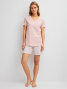 Women model is wearing Short pyjamas made of 100% Cotton in Pink, Floral from the Cotton Special series by CALIDA, Front view