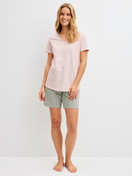 Women model is wearing Short pyjamas made of 100% Cotton in Green, Striped from the Cotton Special series by CALIDA, Front view