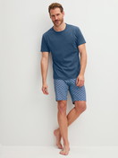 Men model is wearing Short pyjama made of 100% Cotton in Blue, Checked from the Relax Streamline 2 series by CALIDA, Front view