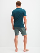 Men model is wearing Short pyjama made of 100% Cotton in Turquoise, Patterned from the Relax Streamline 1 series by CALIDA, Back view