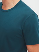 Men model is wearing Short pyjama made of 100% Cotton in Turquoise, Patterned from the Relax Streamline 1 series by CALIDA, Detail