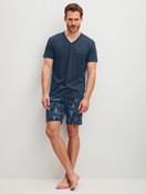 Men model is wearing Short pyjamas made of 100% Cotton in Blue, Patterned from the Relax Streamline 1 series by CALIDA, Front view
