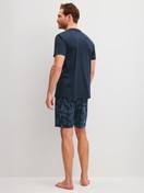 Men model is wearing Short pyjamas made of 100% Cotton in Blue, Patterned from the Relax Streamline 1 series by CALIDA, Back view