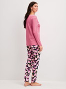 Women model is wearing Pyjamas, long made of 100% Cotton in Pink, Floral from the Autumn Dreams series by CALIDA, Back view