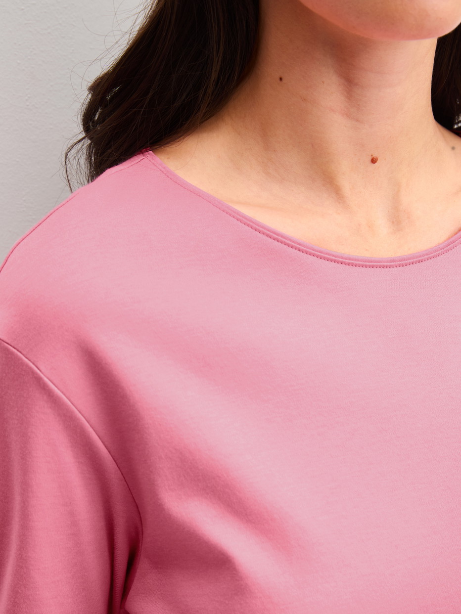 Women model is wearing Pyjamas, long made of 100% Cotton in Pink, Floral from the Autumn Dreams series by CALIDA, Detail