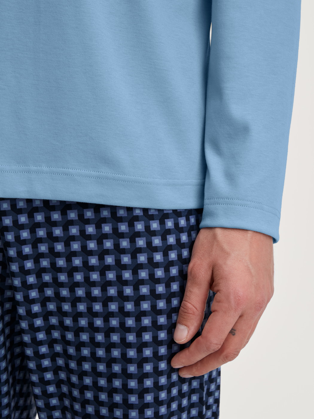 Men model is wearing Pyjamas, long made of 100% Cotton in Blue, Checked from the Relax Streamline 1 series by CALIDA, Detail