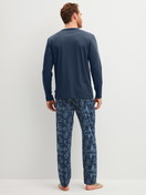 Men model is wearing Pyjamas, long made of 100% Cotton in Blue, Patterned from the Relax Streamline 1 series by CALIDA, Back view