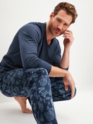 Men model is wearing Pyjamas, long made of 100% Cotton in Blue, Patterned from the Relax Streamline 1 series by CALIDA, Front view