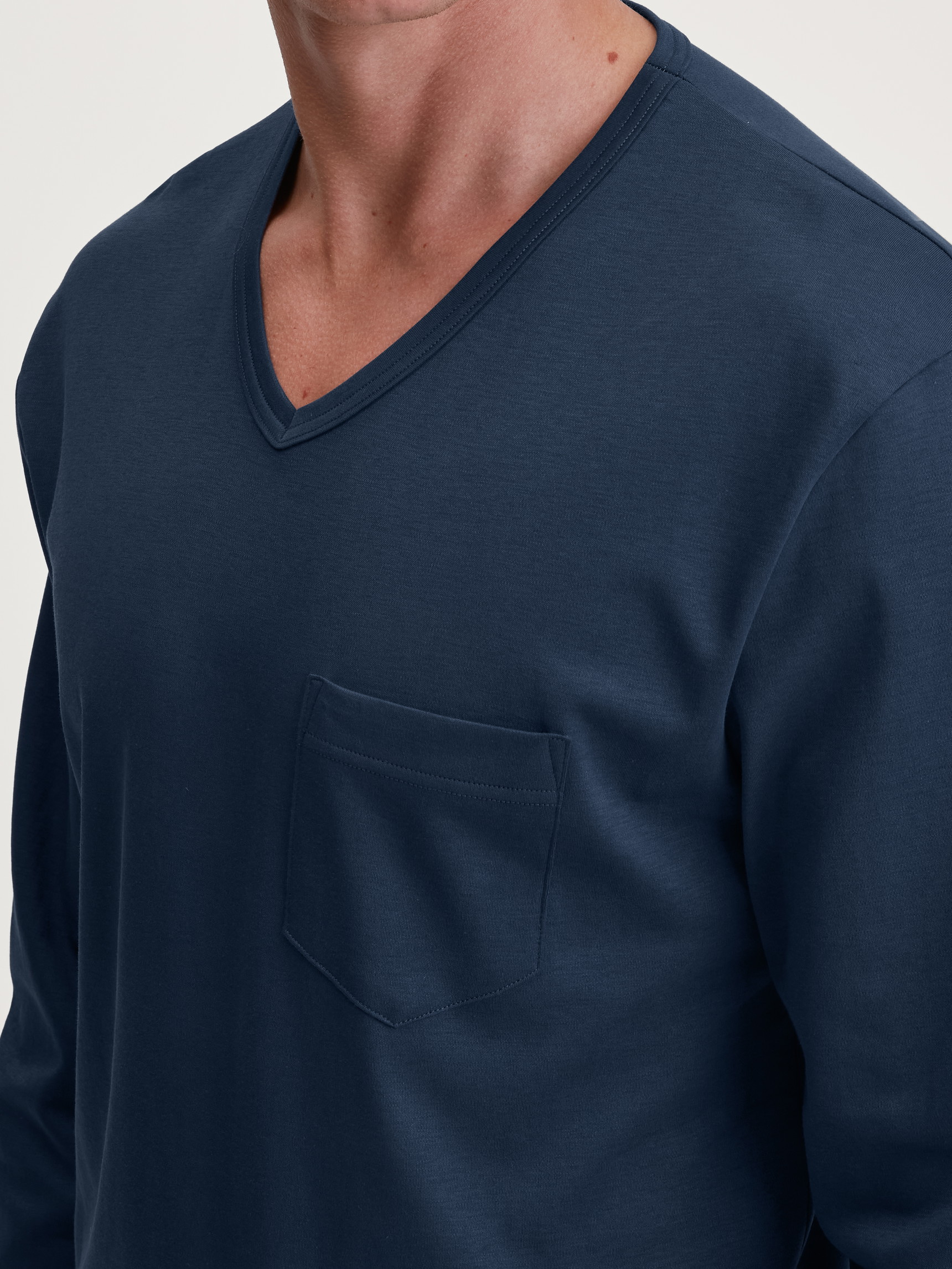 Men model is wearing Pyjamas, long made of 100% Cotton in Blue, Checked from the Relax Streamline 2 series by CALIDA, Detail