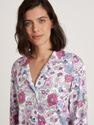 Women model is wearing Button-Up Pyjama made of 100% Cotton in Purple, Floral from the Spring Flower Dreams series by CALIDA, Detail