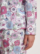 Women model is wearing Button-Up Pyjama made of 100% Cotton in Purple, Floral from the Spring Flower Dreams series by CALIDA, Detail