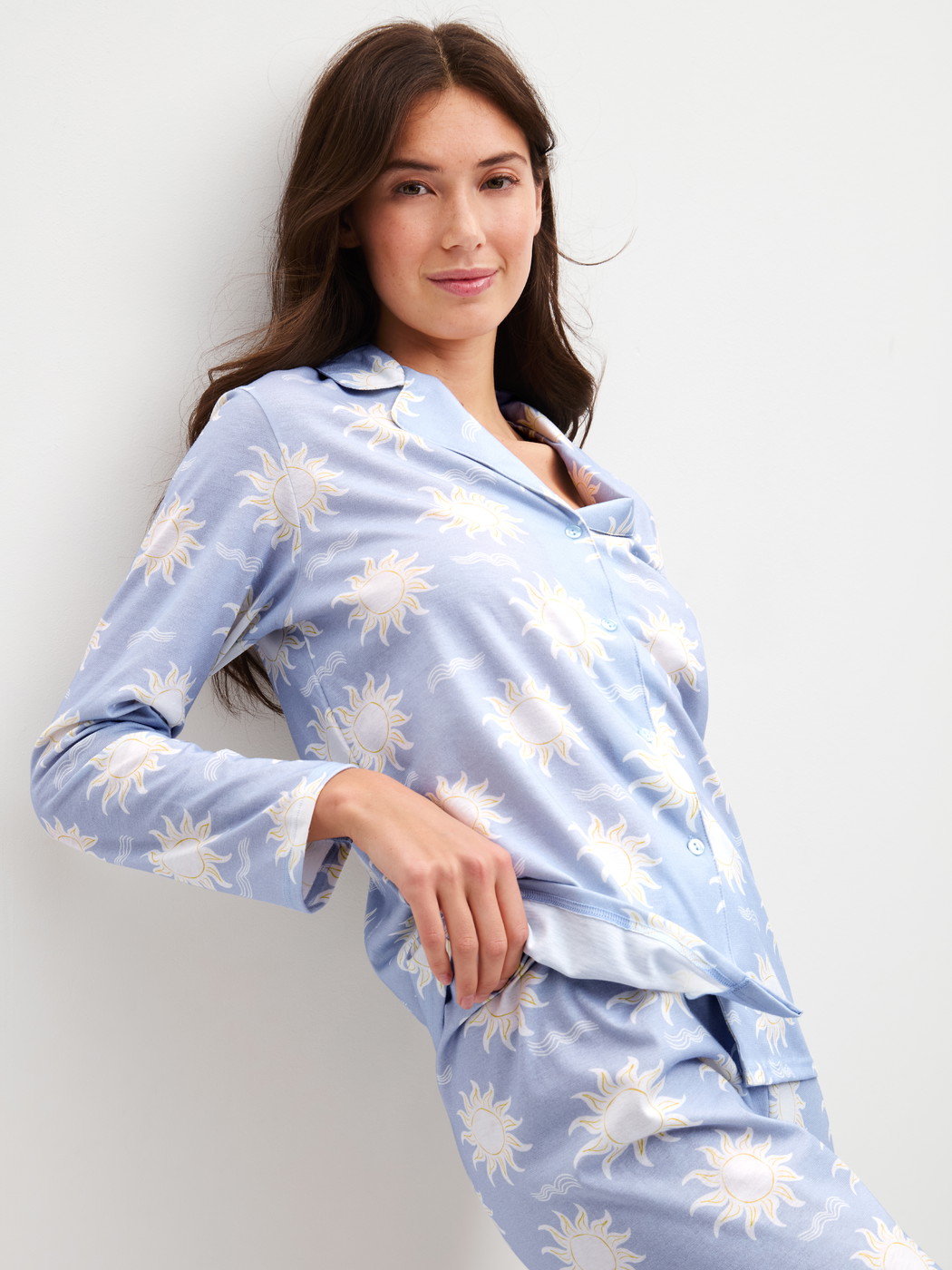Women model is wearing Button-Up Pyjama made of 100% Cotton in Blue, Patterned from the EDITION 85 series by CALIDA, Front view