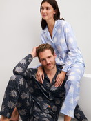 Women model is wearing Button-Up Pyjama made of 100% Cotton in Blue, Patterned from the EDITION 85 series by CALIDA, Additional Image