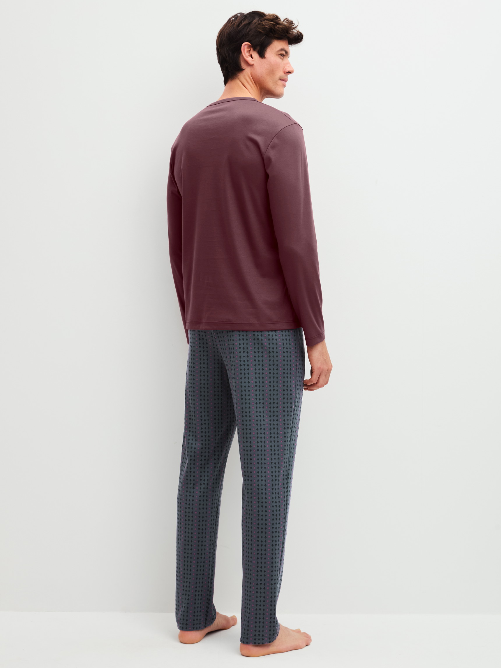 Men model is wearing Pyjamas, long made of 100% Cotton in Red, Striped from the Relax Streamline 4 series by CALIDA, Back view