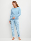 Women model is wearing Pyjama with cuff made of 100% Cotton in Blue, Patterned from the Lovely Nights series by CALIDA, Front view