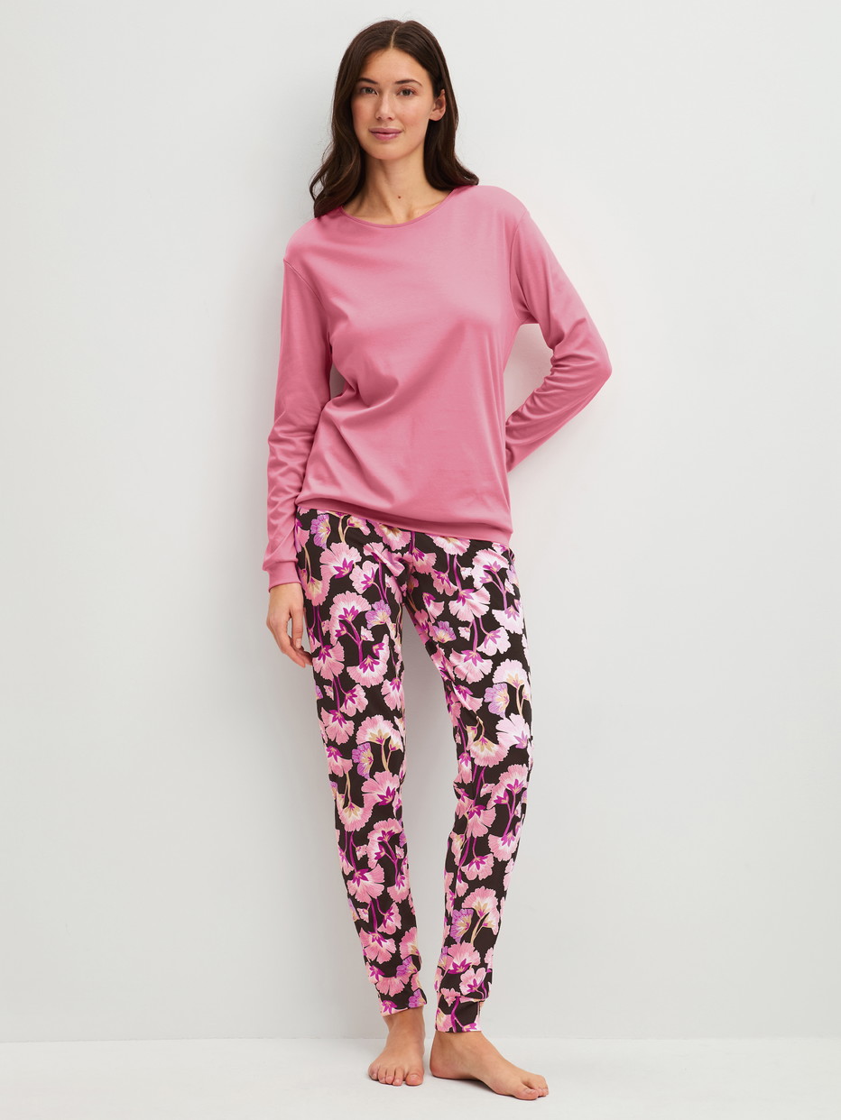 Women model is wearing Pyjama with cuff made of 100% Cotton in Pink, Floral from the Autumn Dreams series by CALIDA, Front view