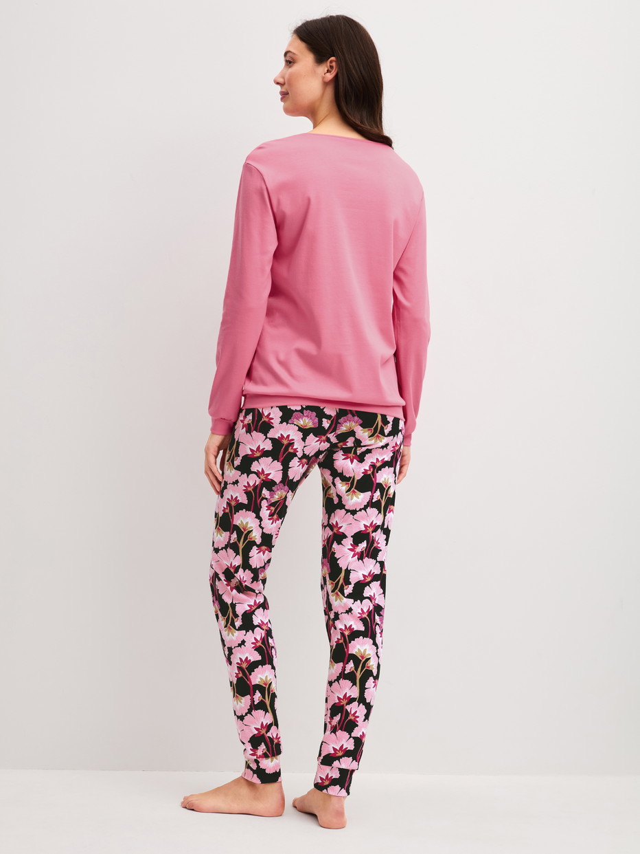Women model is wearing Pyjama with cuff made of 100% Cotton in Pink, Floral from the Autumn Dreams series by CALIDA, Back view