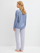 Women model is wearing Pyjamas, long made of 100% Cotton in Blue, Striped from the Cotton Special series by CALIDA, Back view