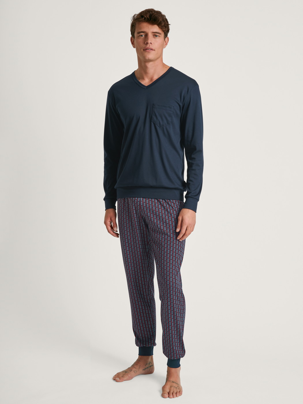 Men model is wearing Pyjama with cuff made of 100% Cotton in Blue, Striped from the Relax Streamline 5 series by CALIDA, Front view