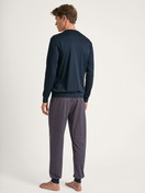 Men model is wearing Pyjama with cuff made of 100% Cotton in Blue, Striped from the Relax Streamline 5 series by CALIDA, Back view