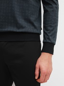Le mannequin Homme porte le/la Pyjama avec bords élastiques en 100% coton de couleur Noir, À motifs, de la série Relax Streamline 2 de CALIDA, Détail