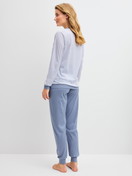 Women model is wearing Pyjama with cuff made of 100% Cotton in Blue, Striped from the Cotton Special series by CALIDA, Back view