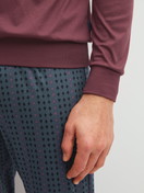 Men model is wearing Pyjama with cuff made of 100% Cotton in Red, Striped from the Relax Streamline 4 series by CALIDA, Detail