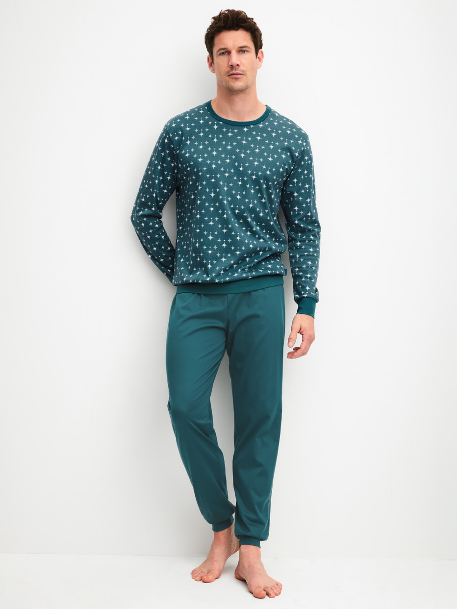Men model is wearing Pyjama with cuff made of 100% Cotton in Turquoise, Patterned from the Relax Streamline 3 series by CALIDA, Front view