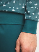 Men model is wearing Pyjama with cuff made of 100% Cotton in Turquoise, Patterned from the Relax Streamline 3 series by CALIDA, Detail