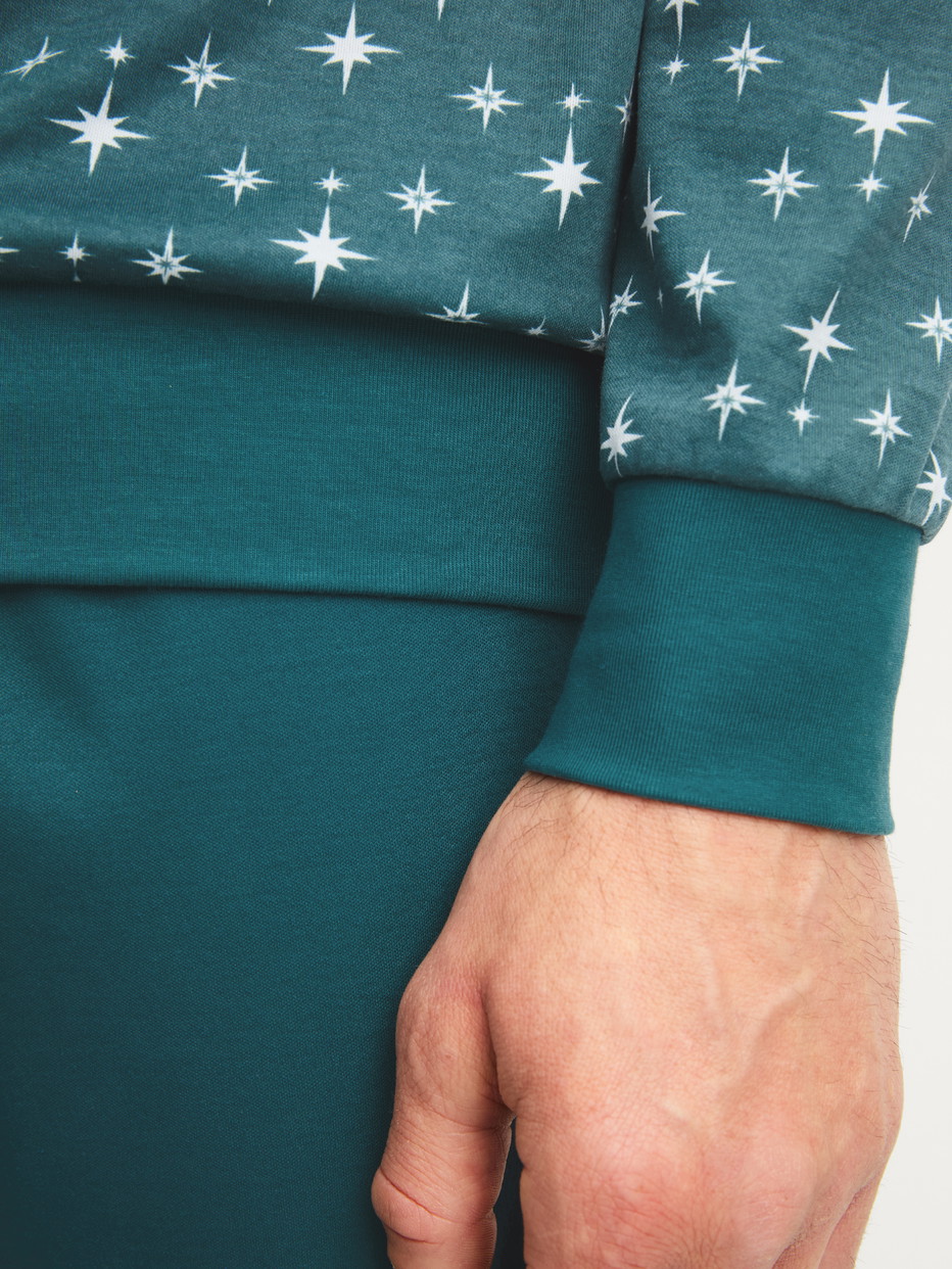 Men model is wearing Pyjama with cuff made of 100% Cotton in Turquoise, Patterned from the Relax Streamline 3 series by CALIDA, Detail