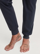 Men model is wearing Pyjama with cuff made of 100% Cotton in Green, Checked from the Relax Streamline 3 series by CALIDA, Detail
