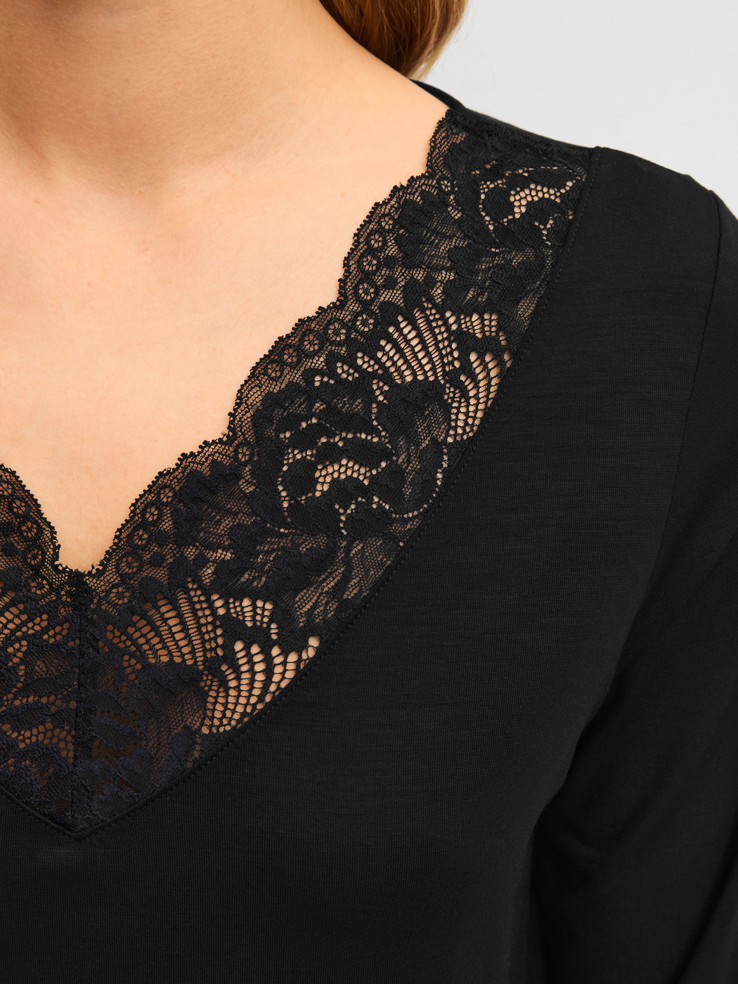 Women model is wearing  made of Modal in Black, Lace from the Elegant Dreams series by CALIDA, Detail