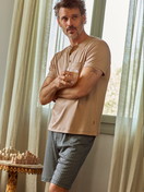Men model is wearing short pyjamas made of 100% Cotton in Blue, Patterned from the Relax Choice 1 series by CALIDA, Front view