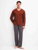 Men model is wearing Pyjamas, long made of 100% Cotton in Red, Patterned from the Cotton Special series by CALIDA, Front view