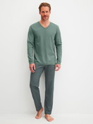 Men model is wearing Pyjamas, long made of 100% Cotton in Green, Patterned from the Cotton Special series by CALIDA, Front view