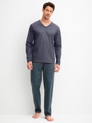 Men model is wearing Pyjamas, long made of 100% Cotton in Black, Patterned from the Cotton Special series by CALIDA, Front view