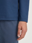 Men model is wearing Pyjamas, long made of 100% Cotton in Blue, Patterned from the Cotton Special series by CALIDA, Detail